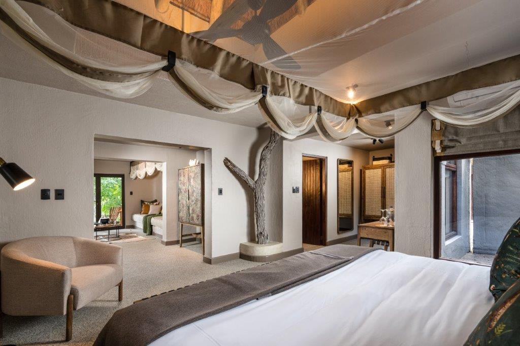 <p>The Suites at Sabi Sabi Bush Lodge are spacious and beautifully decorated with African-inspired furnishings and decor. Each room is equipped with modern amenities, including air conditioning, ceiling fans, and en-suite bathrooms with both indoor and outdoor showers.</p>  <p>The rooms also feature private decks with stunning views of the surrounding bushveld, providing guests with the opportunity to spot wildlife from the comfort of their own room.</p>  <p>Overall, the bedrooms at Sabi Sabi Bush Lodge offer a luxurious and unforgettable safari experience.</p>